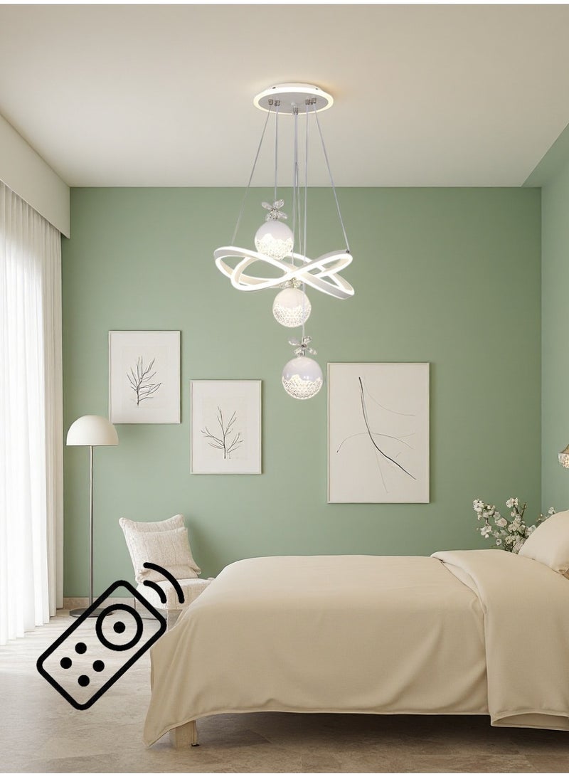 An LED chandelier decorated with crystals, with three adjustable lighting colors, controlled by remote control/switch, adjustable in height, suitable for above the dining table, bedroom, study, and living room. - Image 2